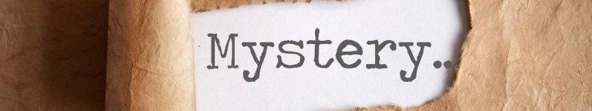 Scritta Mystery su foglio bianco digitata con la macchina da scrivere