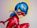 Dettaglio del viso di Lady bug rossa e blu dipinta sul muro di una cameretta di una bambina