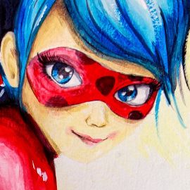 Dettaglio del volto di Ladybug dipinto sul muro con il colore rosso e blu