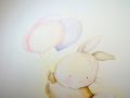 Murale che raffigura un morbido coniglietto che si fa trasportare in volo da tre palloncini